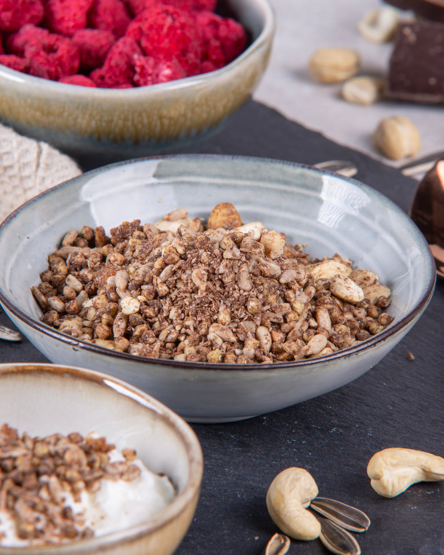 Elly Momberg Organic Raw quality granola with buckwheat, sunflower seeds, carob, raspberry and almonds, no added sugar, gluten free, vegan