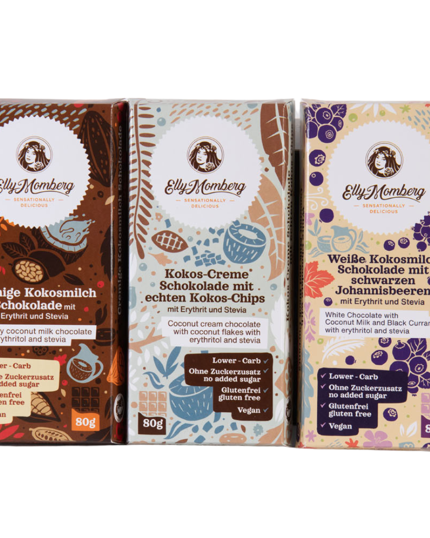Trio, creamy coconut milk chocolate, coconut cream chocolate with coconut flakes, White coconut milk Chocolate bar  with black currants, bar of chocolate, keto friendly, chocolate, with coconut chips, no added sugar, vegan, gluten free, diabetics, keto diet, bar of chocolate