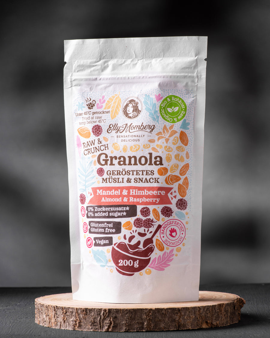Elly Momberg Organic Raw quality granola with  buckwheat, sunflower seeds, carob, raspberry and almonds, no added sugar, gluten free, vegan