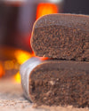 Chocolate gourmet bar with a cross-section on a dark surface with cocoa rum, sugar free, vegan, gluten free, keto. lowert carb, diabetics