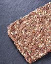 Seed cracker on dark slate surface
