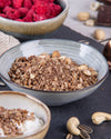 Elly Momberg Organic Raw quality granola with  buckwheat, sunflower seeds, carob, raspberry and almonds, no added sugar, gluten free, vegan