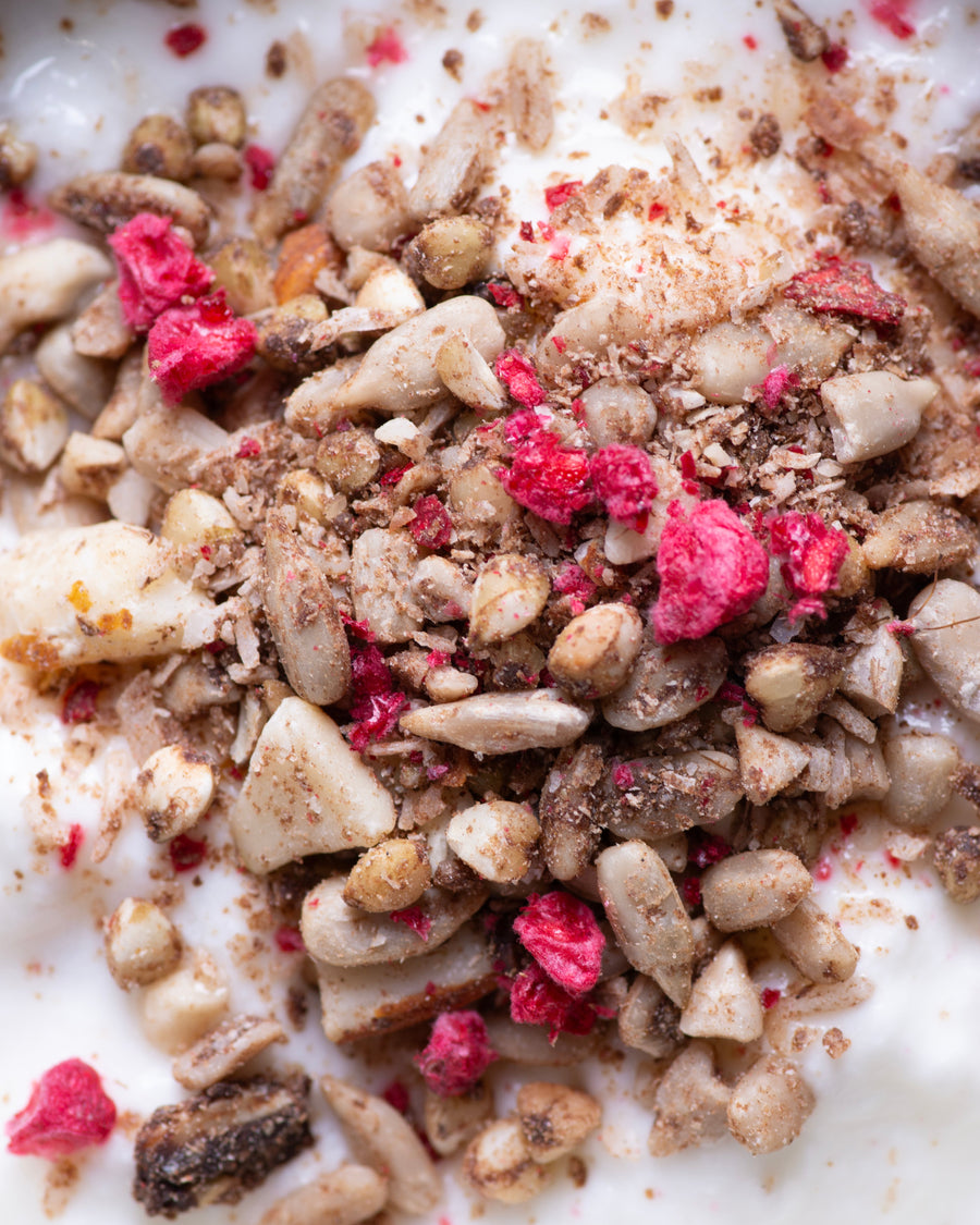 Elly Momberg Organic Raw quality granola with  buckwheat, sunflower seeds, carob, raspberry and almonds, no added sugar, gluten free, vegan