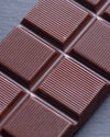 Close-up of a chocolate bar with a dark background