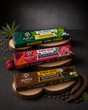 Energie Riegel, Power, Rohkost, Protein, Eiweiß, Pre Workout, Sport, Fitness, laktosefrei, vegan, glutenfrei, ohne Zuckerzusatz, Carob, Johannisbrotkernbaum, Dattel, Elly Momberg, Bio, Organic, Hanf, Himbeer, Haselnüsse