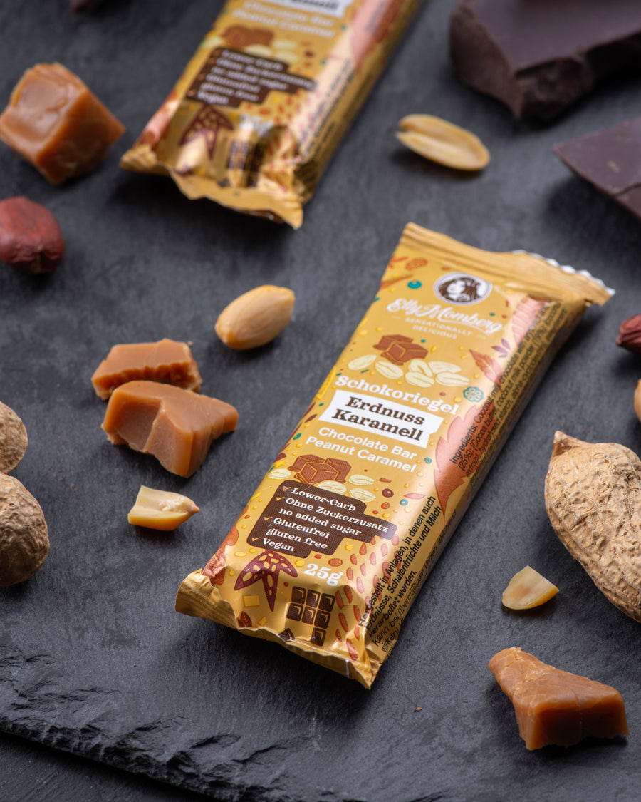 Chocolate peanut caramel gourmet bar with a cross-section with peanuts, sugar free, no added sugar, vegan, gluten free, keto. lower carb, diabetics