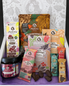 Probier-Set Groß als geöffnete Box mit den Kekse, Aufstrich, Schokodrops, Schokolade und Riegel vorhanden. 