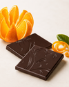 Schokolade Mini mit Orange im Hintergrund. 