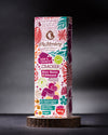 Bio Rohkost Cracker Rote Beete mit Kümmel, vegan und glutenfrei von Elly Momberg, Packung steht auf Holzuntersetzer

